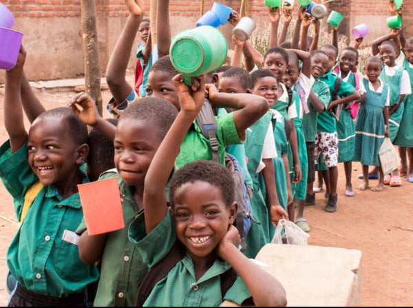 Children arrive for school — and food