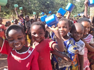 Children gathering for school meals