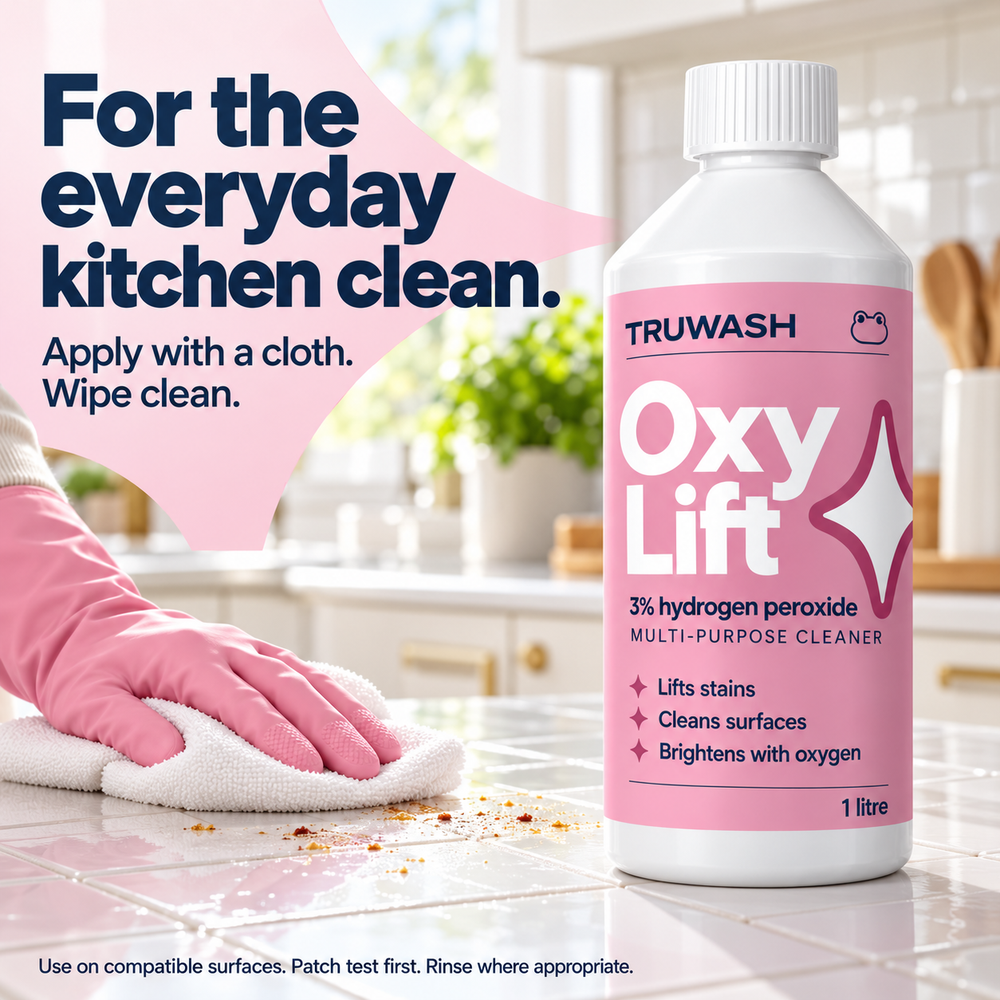 OxyLift bottle and cloth in a kitchen cleaning setting