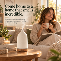 TruMist diffuser in a living room with a woman relaxing and the headline Come home to a home that smells incredible